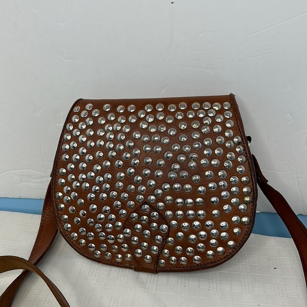 Vintage Wester flare studded leather saddle bag